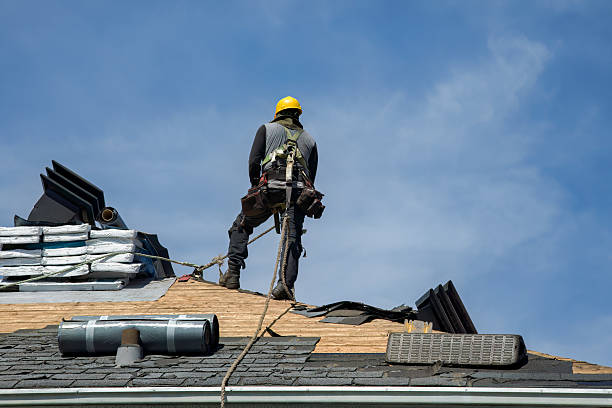 Professional Roofing technician working in Roslyn Heights, NY